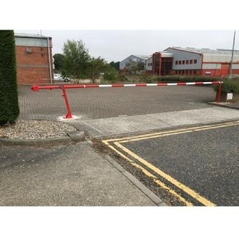 Manual barrier across car park entrance
